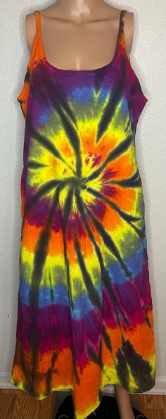 Spiral tie dye sun dress, spaghetti straps (not adjustable), with pockets!! Beautiful dress, perfect for summertime. No Size tags but fits like women's l/xl. %100 cotton. Never worn, not preowned. Vintage but new! New/old store stock from the 1990's. Multicolor Cotton Sundress For Beach Season, Casual Sundress With Spaghetti Straps For Festivals, Casual Tie Dye Dress With Spaghetti Straps, Multicolor Cotton Sundress With Spaghetti Straps, Hand Dyed Multicolor Summer Dress, Multicolor Hand Dyed Summer Dress, Tie Dye Cotton Sleeveless Dresses, Tie Dye Sleeveless Cotton Dress, Tie Dye Sundress For Spring