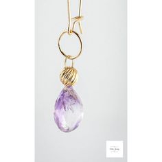 These Amethyst and Gold Drop Earrings are a stunning addition to any jewelry collection. These drop earrings are so pretty. The transparent faceted amethyst teardrops have beautiful purple, white, and pale-yellow hues that sparkle in the light. The stones are teardrop shaped. They add elegance and originality to your look! Unbelievably beautiful, faceted, teardrop-shaped amethyst stones. The earrings are finished with high quality 14K gold-filled ear wires that have a secure closure Fancy 14K go Purple Gemstones, Yellow Hues, Long Gold Earrings, Amethyst Stones, Artisan Rings, Fancy Beads, Boho Chic Jewelry, Gemstone Jewelry Handmade, Chic Jewelry