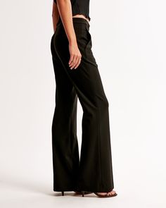 Mid rise, flare pants in a menswear fabric, featuring a removable mini belt, slim waistband, functional pockets and a zipper closure. Flare Pant, Women's Bottoms, Athletic Fits, New Arrival Dress, Swimwear Accessories, Flare Pants, Abercrombie Fitch, Jumpsuit Dress, Nice Dresses