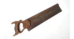 an old rusty knife with a wooden handle