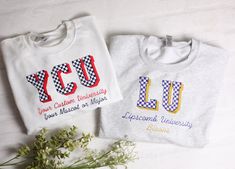 Customize your cozy sweatshirt with your college name, mascot, sport, school name, or more!  Makes a great way to announce on decision day, or a great graduation gift for any student. Choose a crew neck or hoodie in your favorite color. Initials (capital letters) will be embroidered in the fun and trendy checker font for the top line, and script letters for the bottom line as shown in the photos. Our high quality embroidery ensures that the shirt will last a long time, unlike screen printing or Team Spirit Sweatshirt With Custom Embroidery For Game Day, College Team Spirit Sweatshirt With Embroidered Graphics, Game Day White Sweatshirt With Embroidered Graphics, White Game Day Sweatshirt With Embroidered Graphics, White Embroidered Logo Sweatshirt For Game Day, Collegiate Custom Embroidered Sweatshirt For College, College Team Spirit Sweatshirt With Custom Embroidery, Custom Embroidery Team Spirit Sweatshirt For College, White Collegiate Sweatshirt With Letter Embroidery