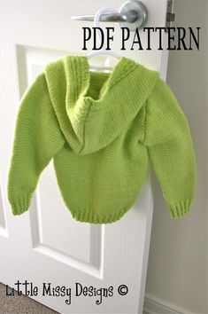 a green knitted sweater hanging on a door with text overlay that reads, free knitting pattern little miss designs