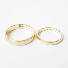 two gold wedding rings with the word hope and hope engraved on them