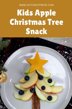 an apple christmas tree snack on a white plate