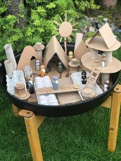 an outdoor picnic table made out of cardboard