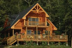 a large wooden house in the woods