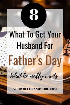 a pair of brown shoes sitting on top of a wooden table with the words what to get your husband for father's day