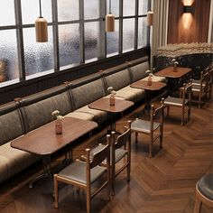 an empty restaurant with wooden tables and chairs