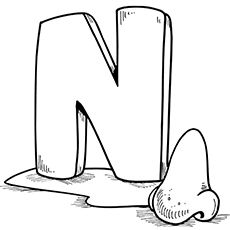 the letter n is made out of wood and has been drawn by hand with black ink