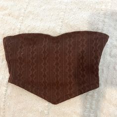 Never Worn, Perfect Condition. Size Xs Brown Fitted Knit Crop Top, Fitted Brown Knit Crop Top, Brown Fitted Strapless Top, Fitted Knit Strapless Tube Top, Fitted Seamless Knit Tube Top, Fitted Strapless Knit Tube Top, Fitted Strapless Brown Top, Brown Stretch Tube Top For Spring, Spring Brown Stretch Tube Top