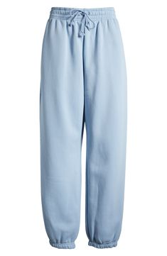 These midweight sweatpants are made of a brushed cotton-blend fleece to keep you feeling cozy no matter where the day takes you. 29 1/2" inseam; 11" leg opening; 12" front rise; 16 1/2" back rise (size Medium) Elastic/drawstring waist Side-seam pockets 80% cotton, 20% polyester Machine wash, tumble dry Imported Cute Sweat Pants, Clothes Sweatpants, Blue Nike Sweatpants, Colorful Sweatpants, Aesthetic Sweatpants, Womens Nikes, Sweatpants Aesthetic, Light Blue Sweatpants, Colored Sweatpants