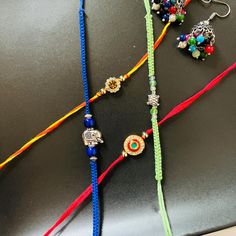 Celebrate the bond of love and protection with our modern, minimalistic handmade rakhis that are perfect for year-round wear! Introducing our exclusive collection of handmade rakhis, crafted with 100% bright colored cotton thread, designed to add a touch of elegance to your Raksha Bandhan celebration. Our rakhis are the perfect blend of tradition and modernity, offering a sleek, non-bulky design that men can comfortably wear all year round. Each rakhi in our collection is a testament to quality and craftsmanship. Customers can choose from four unique designs, each thoughtfully created to symbolize the special bond between siblings. Simply select your preferred design under the variations to make your choice. Why Choose Our Rakhis? - Premium Quality: Made with 100% bright colored cotton thr Traditional Jewelry With Sliding Knot For Gifts, Traditional Sliding Knot Jewelry As Gift, Aesthetic Rakhi, Macrame Simple, Rakhi Message, Rakhi Online, Raksha Bandhan Gifts, Handmade Aesthetic, Handmade Rakhi