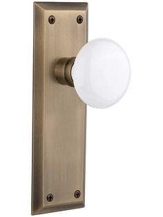 an image of a door handle with a light on the front and back side, against a white background