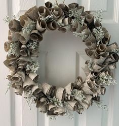 a wreath made out of old book pages