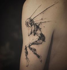 a black and white photo of a person with a tattoo on their back, holding an arrow