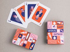 four playing cards with pictures of people on them, one is orange and the other is blue