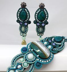 Embroidery jewelry set  Soutache bracelet and earrings with chrysocolla This beautiful set of green and white handmade chrysocolla jewelry is sewn using the technique of embroidered embroidery This is a wonderful gift for your wife's anniversary to her friend or herself. The set consists of earrings and a bracelet Earrings in the size of 3.5-0.98 inches, a bracelet in the size of 7-2.16 inches (971673) Chrysocolla Jewelry, Navy Blue Earrings, Soutache Bracelet, Soutache Necklace, Rose Quartz Earrings, Soutache Earrings, 1st Birthday Gifts, Soutache Jewelry, 40th Birthday Gifts