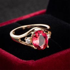 Make a statement with every handshake and wave while wearing this bold rose goldtone ring that features crystal and cubic zirconia accents for plenty of sparkle and shimmer. 0.31'' W x 0.39'' L Gold-plated copper / cubic zirconia / genuine crystal Silver Ruby Ring, Garnet Birthstone, Red Ring, Gemstone Engagement, Cubic Zirconia Rings, Men's Jewelry Rings, Elegant Ring, Engagement Jewelry, Ring Ring