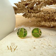 Indulge in the beauty of these Mojave Light Green Stud Earrings, a perfect combination of sophistication and simplicity. Featuring a Minimalist Peridot Stud design with a unique Kintsugi Inspired touch, these Green Circle Stud Earrings in Gold are a must-have for any jewelry collection. Elevate your style with these elegant Gold Gemstone Studs that effortlessly combine modern style with timeless elegance. ------------------------ Item Details ------------------------ Minimalist Peridot Stud with Green Stud Earrings, Green Circle, Stud Design, August Birthstone, Circle Earrings Studs, Circle Studs, Earrings Green, Gemstone Studs, Light Turquoise