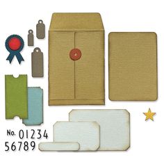 an assortment of crafting supplies including envelopes and tags