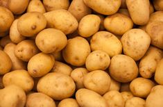 a pile of potatoes sitting next to each other