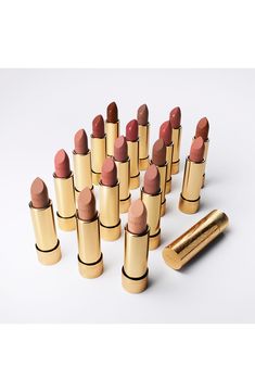 What it is: A lipstick that delivers a perfect and long-lasting satin finish.What it does: It leaves lips smooth, soft and covered in lightweight, comfortable color. It is presented in a gold tube etched with a decorative style drawn by Alessandro Michele. How to use: Apply directly to lips. Use the sharp edge to contour. 0.12 oz. Paraben-free; sulfate-free; phthalate-free Vegan Made in Italy Satin Lipstick, Alessandro Michele, Sulfate Free, Paraben Free, Satin Finish, Paraben Free Products, How To Use, Long Lasting, Lips