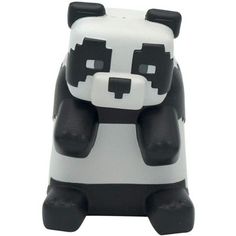 a black and white panda bear figurine on a white background