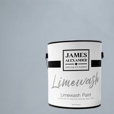 a white paint can with the words limewash painted on it's bottom half