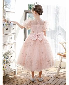 Buy super cute bling sequins pink tulle girls formal gown with bubble sleeves at wholesale price online. Free shipping and pro custom service since 2009. Princess Glitter Tulle Pageant Dress For Prom Season, Princess Style Glitter Tulle Pageant Dress For Prom, Pink Sequin Ball Gown For Prom, Pink Sequined Prom Ball Gown, Pink Princess Dress For Prom Season, Pink Sequined Ball Gown For Parties, Princess Style Sequin Tulle Dress For Prom, Pink Glitter Tulle Ball Gown For Prom, Pink Sequin Pageant Dress For Dress-up