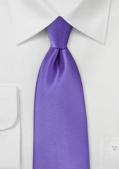 The African freesia flower, a sign of friendship that is commonly used to commemorate the 7th Wedding Anniversaries, served as the inspiration for this handcrafted Puccini necktie in purple Freesia. There is no better way to say "I do" to your closest friend than with the perfect necktie, and that holds true whether it's the first time or the eighth time. Using this item with one of our coordinating pocket squares and a suit in either black or charcoal will give you a dazzling appearance. Formal Purple Tie, Elegant Purple Party Ties, Classic Purple Ties As Gifts, Elegant Lavender Standard Tie, Elegant Lavender Tie For Black Tie Events, Elegant Lavender Standard Tie For Suit, Elegant Lavender Ties For Black Tie Events, Elegant Lavender Ties For Formal Occasions, Classic Purple Wedding Tie