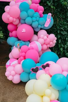 there are many balloons in the shape of animals