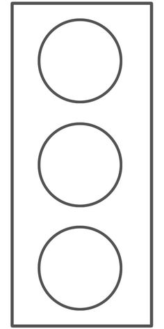 a traffic light is shown with two circles on the front and one circle on the back