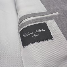 Cesare Attolini is a renowned Italian luxury menswear brand, celebrated for its exceptional craftsmanship and exquisite tailoring. With a heritage dating back to the 1930s, each garment is meticulously handcrafted using the finest materials and techniques. Discover timeless elegance and impeccable style with Cesare Attolini's collection of suits, jackets, and shirts. Elevate your wardrobe with their signature attention to detail and unparalleled quality. NEW R7 Drop - Regular Fit Chambray Gray C Fitted Designer Double Breasted Suit, Designer Fitted Double Breasted Suit With Button Closure, Custom Fit Blazer With Suit Collar And Buttons, Tailored Luxury Suits, Luxury Fitted Suits With Button Closure, Custom Fit Blazer With Buttons For Work, Designer Suits With Button Closure, Elegant Sets With Lapel Collar And Buttons, Luxury Tailored Suits With Button Closure