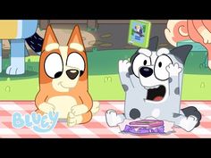 two cartoon dogs sitting on top of a table next to each other with their mouths open