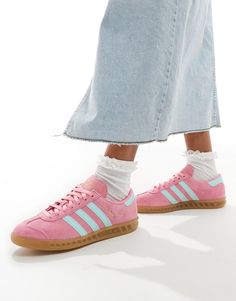 Shoes by adidas Sneaking into your wardrobe Low-profile design Lace-up fastening Padded cuff Signature adidas branding Gum sole Textured grip tread Adidas Hamburg Pink, Adidas Shoes Women Outfit, Adidas Pink Shoes, Colorful Sneakers Outfit, Colorful Adidas, Pink Shoes Outfit, Pink Adidas Shoes, Adidas Hamburg, Shoes Trending