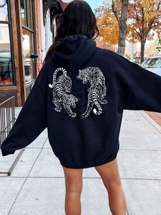 Get OBSESSED with the Vintage Tiger Aesthetic with this cute Vintage Tigers Hoodie! This Tiger Sweatshirt is super comfy! Size up for a Trendy Oversized Look! SHIPS FREE! SIZING TIPS: Size up 2-3 sizes from your "usual size" to get the "Oversized" Look! (2 sizes up is most common, and 3 sizes up is more dramatic) For a "relaxed fit" order your "usual size". When in doubt, lay your favorite fitting Sweatshirt flat and measure armpit to armpit and compare the width against the Size Chart in the ph Oversized Graphic Sweatshirt Outfit, Trendy Hoodie Designs, Creative Hoodies, Vintage Hoodies Aesthetic, Tiger Aesthetic, Graphic Hoodies Aesthetic, Tiger Hoodie, Vintage Tiger, Christmas Delivery