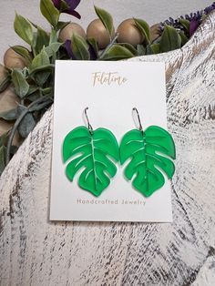 Bright green monstera acrylic earrings.  These earrings are made from acrylic and silver finish stainless steel earring hooks. Each earring measures approximately 2 inches from top of the earring hook until the bottom of the earring. This listing is for one pair only. Fun Green Nickel-free Earrings, Trendy Green Leaf-shaped Jewelry, Fun Green Drop Earrings, Green Fun Drop Earrings, Green Dangle Earrings With Fun Style, Green Hypoallergenic Earrings For Summer, Summer Green Hypoallergenic Earrings, Trendy Green Hypoallergenic Earrings, Trendy Hypoallergenic Green Earrings