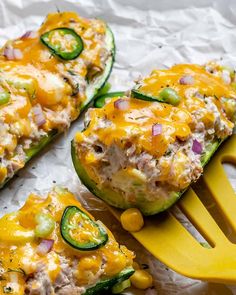 the stuffed zucchini boats are loaded with chicken, cheese and veggies