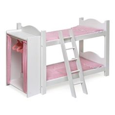 a dollhouse bunk bed with pink curtains