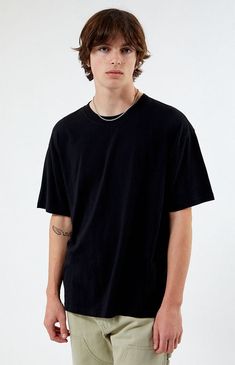 The Basic Oversized Boxy T-Shirt from PS Basics has major chill vibes. This everyday tee has a comfortable oversized fit with short sleeves, a crew neckline, and a boxy fit.   	Solid color tee 	Short sleeves 	Crew neckline 	Boxy oversized fit 	100% Cotton 	Machine washable 	Model is wearing a size medium