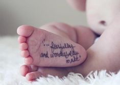 a baby's foot with writing on it that says, i love you daddy and wonderfully made