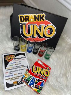 the uno drinking game is in its box and it's contents are on display