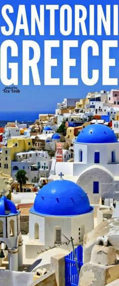 the cover of a book with blue domes and white buildings on it, in front of an ocean