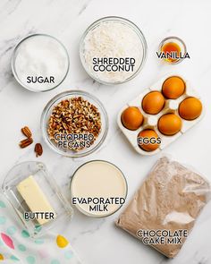 ingredients to make an egg muffin recipe laid out on a white marble counter top