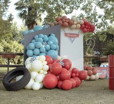 balloons are arranged in the shape of a race car