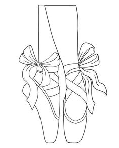 a pair of ballet shoes with a ribbon tied around them