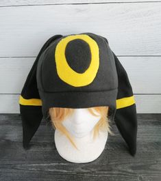 These hats are made from fleece and interfacing in the ears but still have floppiness to them and do not stand up (sorry but I do not offer this option). ⫸ Perfect for: fans, cold weather, costumes, or conventions. Very warm! ⫸ Size: Fits anyone age 5+, one size fits most. Circumference about 24-25 in. ⫸ Care instructions: I recommend hand wash but should be fine in machine wash cold. All hats are made in a smoke-free, pet-free environment. All hats are made with a sewing machine. Patterns and d Themed Fitted Hat For Cosplay, Halloween Cosplay Beanie Hat, Black Hat For Cosplay, Themed Cosplay Hat, One Size Fits Most, Themed Hats For Cosplay, One Size Fits Most, Themed Cosplay Hat, Adjustable Beanie Hat For Cosplay, Adjustable Beanie For Cosplay, Black Hat For Cosplay, One Size Fits Most