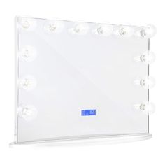 an illuminated vanity mirror with dim lights on the sides and buttons at the bottom for easy lighting