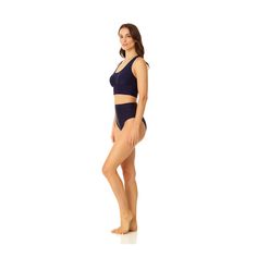 Our Coppersuit Banded Halter Longline Bra is the ultimate sleek swimwear for the modern, active individual. Offering UPF 50+ protection, this swimsuit bra is designed with copper-infused fabric as well as antibacterial and odor-control properties to keep you feeling fresh all day long. Removable cups and a stylish racerback halter design will give you comfortable and secure support for all your activities in and out of the water. Pair this sleek swim top with any Coppersuit Swim Bottom for a com Compressive Swimwear With Built-in Bra For Beach, Contoured Swimwear With Built-in Bra, Modern Stretch Swimwear For The Pool, Modern Seamless Swimwear For Beach, Modern Solid Swimwear With Seamless Construction, Modern Solid Color Swimwear With Seamless Construction, Modern Solid Color Seamless Swimwear, Underwire Swimwear With Seamless Construction, Modern Stretch Swimwear For Poolside