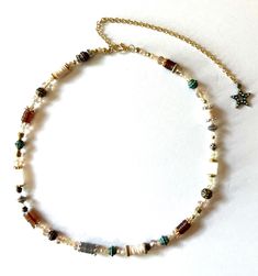 This handmade necklace is a unique piece of bohemian-inspired jewelry. The necklace features many colorful beads and is adjustable to fit necklines between 17-23 inches. The necklace is perfect for those who love fashion and costumes, and it is a great addition to any jewelry collection. The necklace is made with high-quality materials and is sure to last for years to come. Handmade Beaded Necklace, Handmade Beaded Necklaces, Inspired Jewelry, Love Fashion, Aberdeen, Handmade Necklace, Boho Necklace, Handmade Necklaces, Unique Pieces